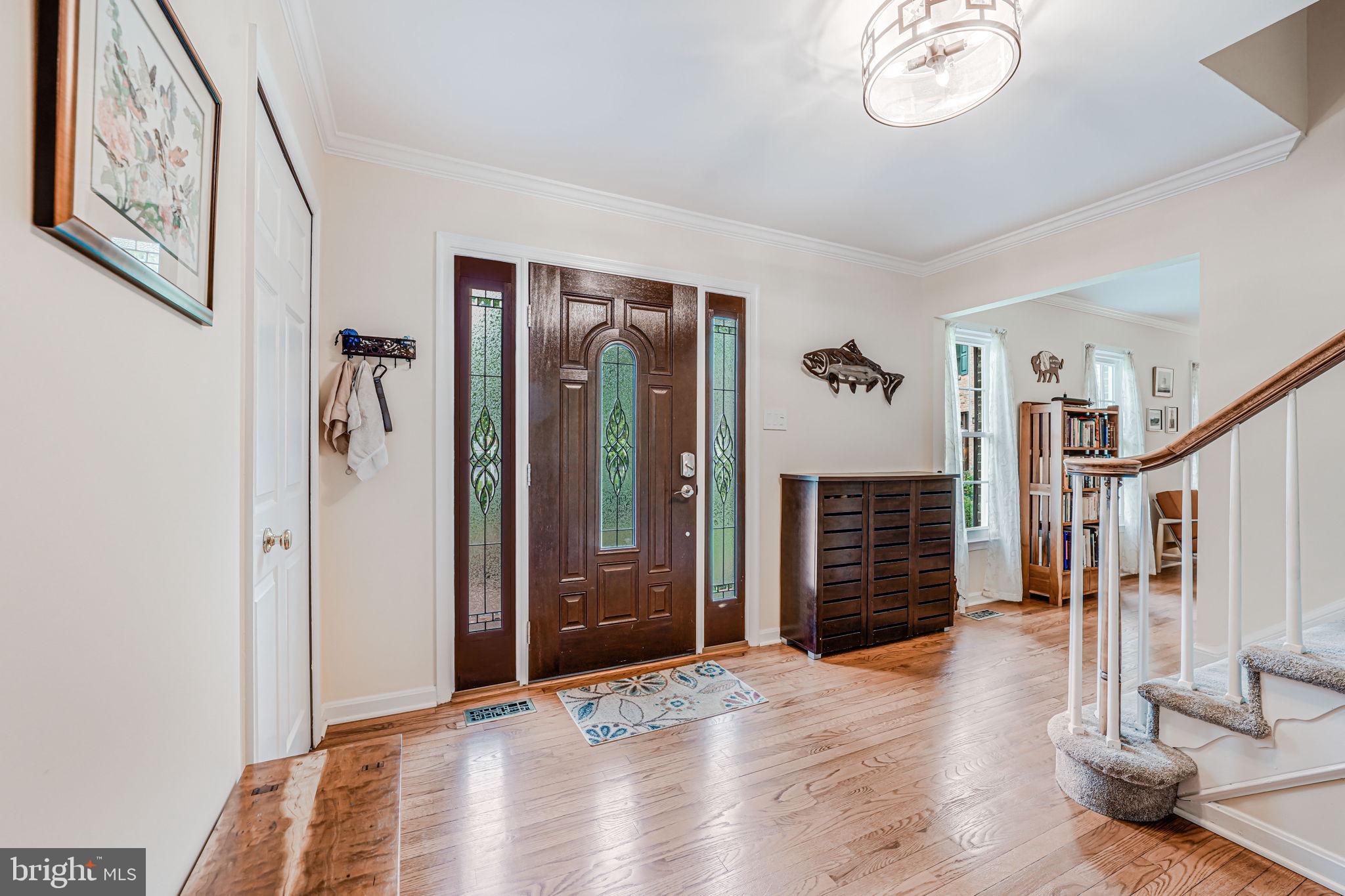 9802 Natick Road Burke, VA 22015 - Photo 2 of 45 a view of an entryway with wooden floor
