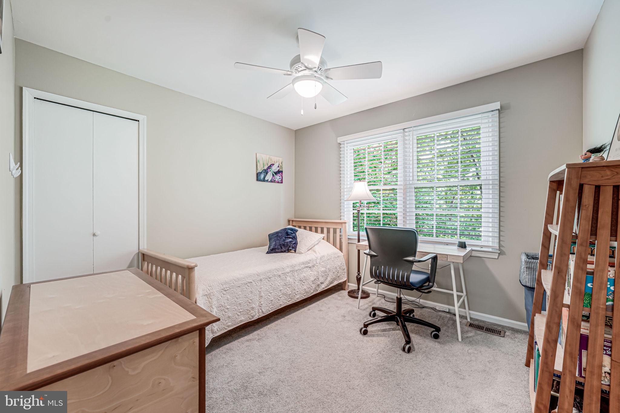 9802 Natick Road Burke, VA 22015 - Photo 25 of 45 a room with furniture and a window