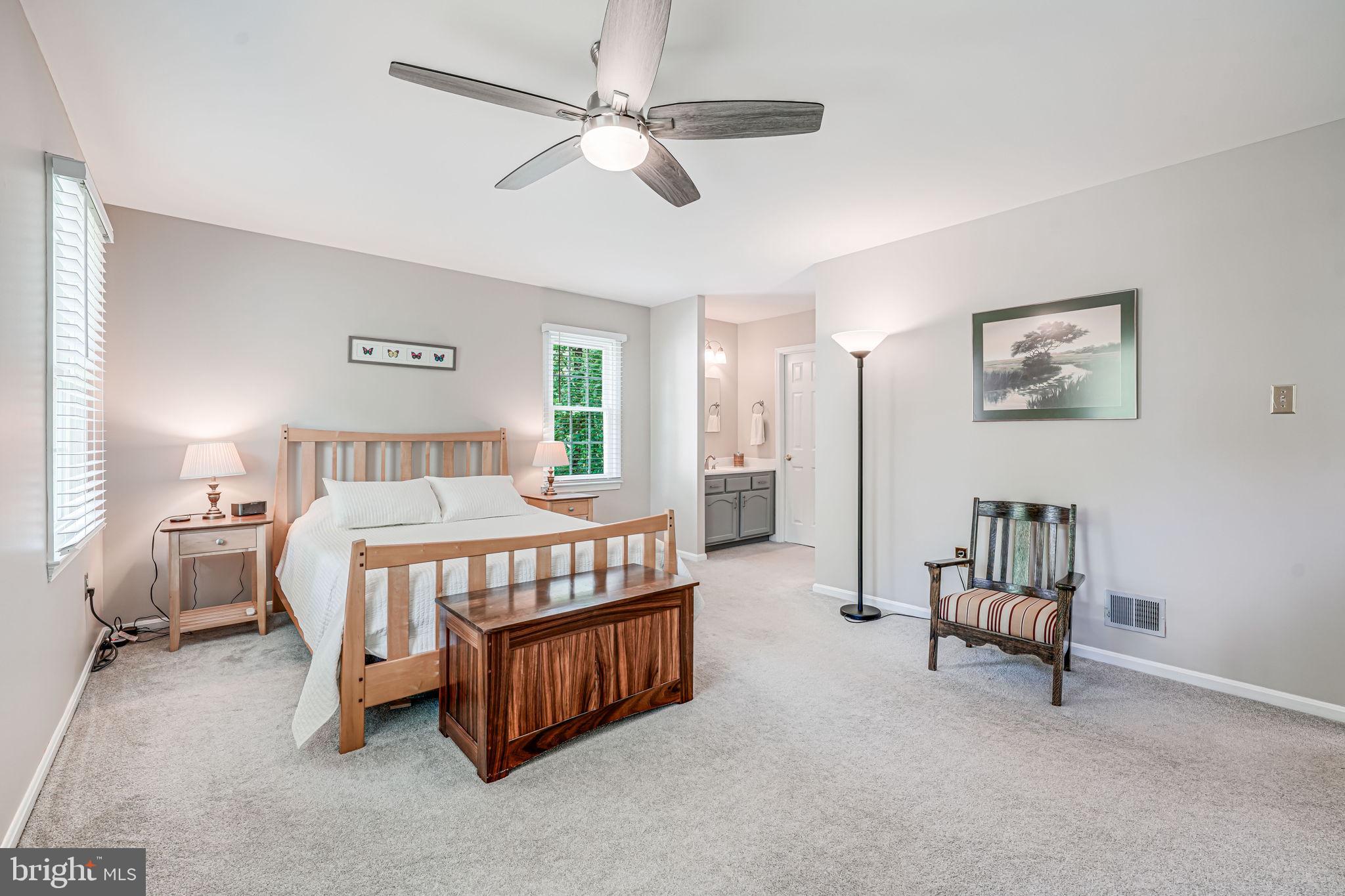 9802 Natick Road Burke, VA 22015 - Photo 27 of 45 a bedroom with a bed furniture and window