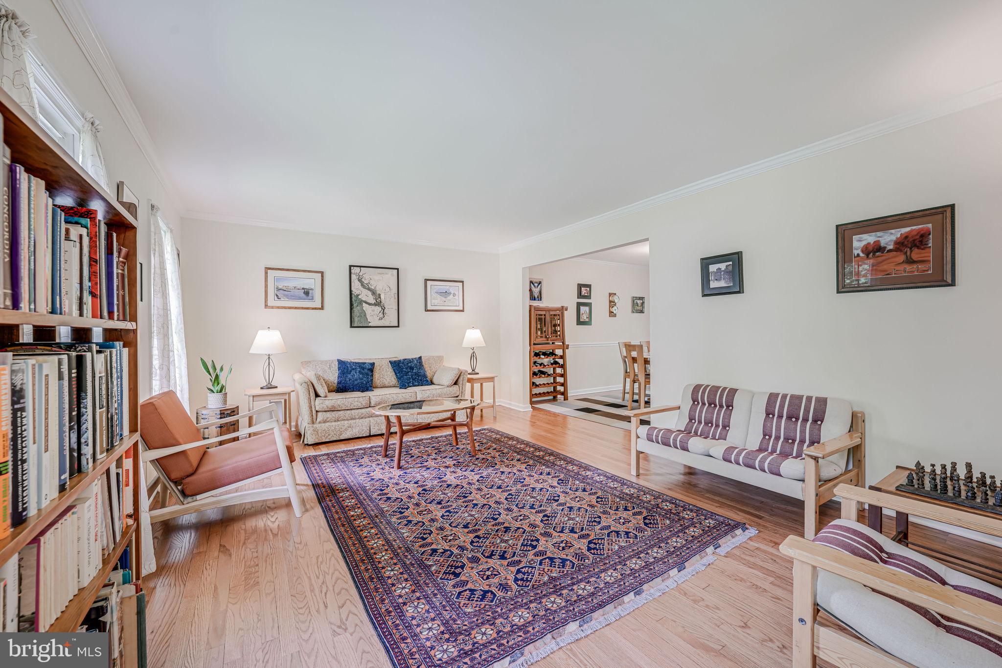 9802 Natick Road Burke, VA 22015 - Photo 5 of 45 a living room with furniture and a rug