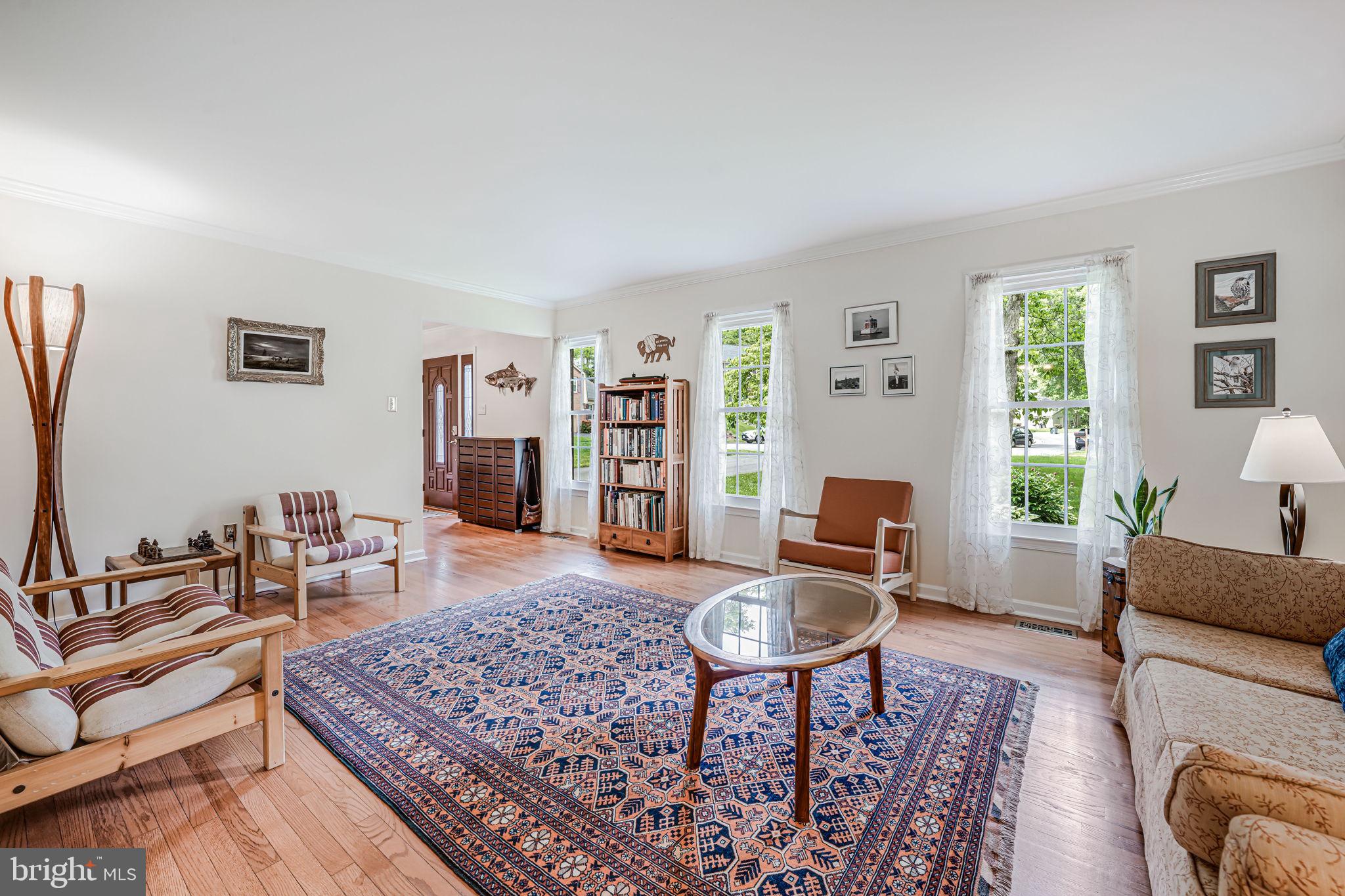 9802 Natick Road Burke, VA 22015 - Photo 6 of 45 a living room with furniture and wooden floor