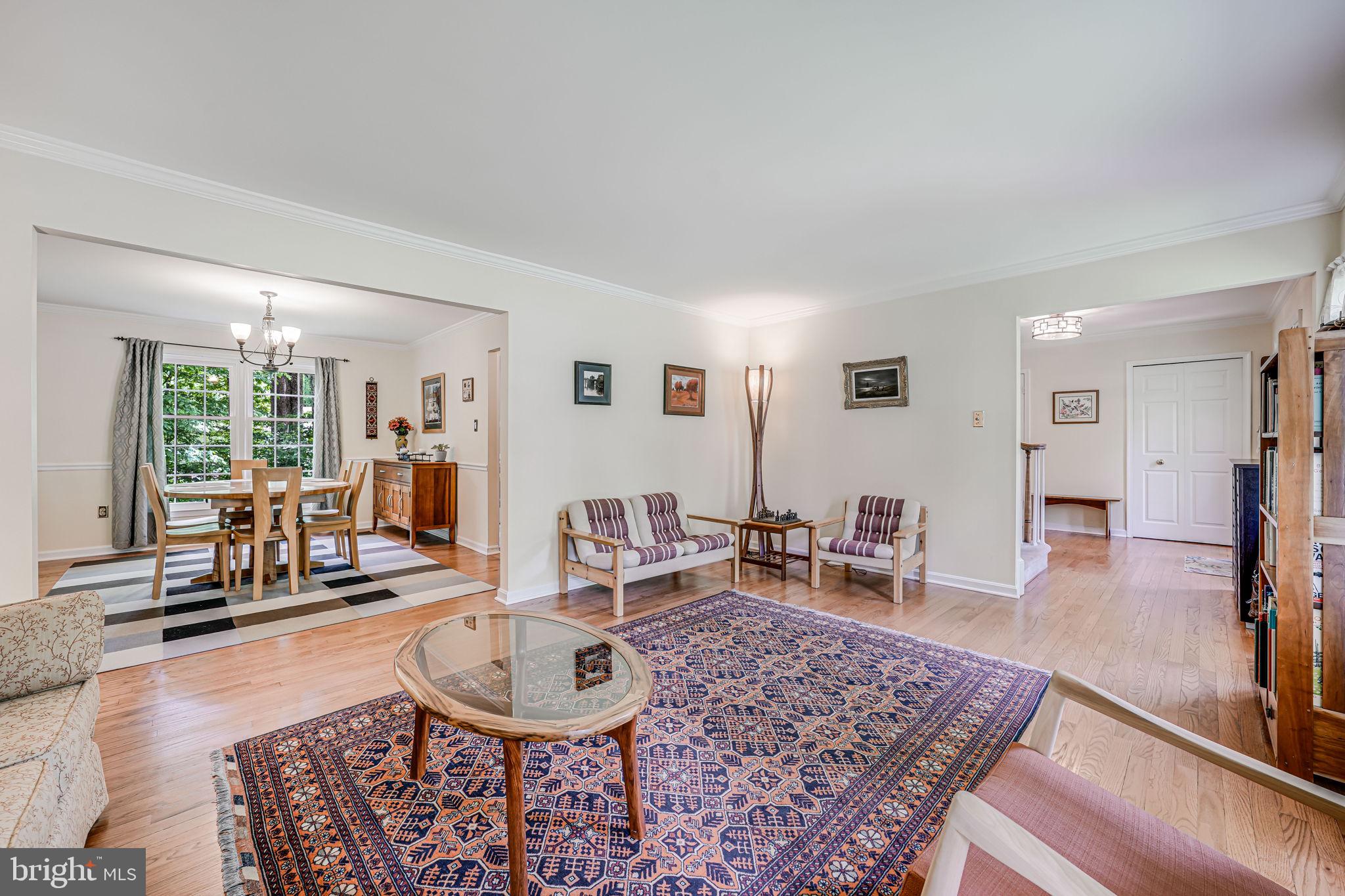 9802 Natick Road Burke, VA 22015 - Photo 7 of 45 a living room with furniture and a table