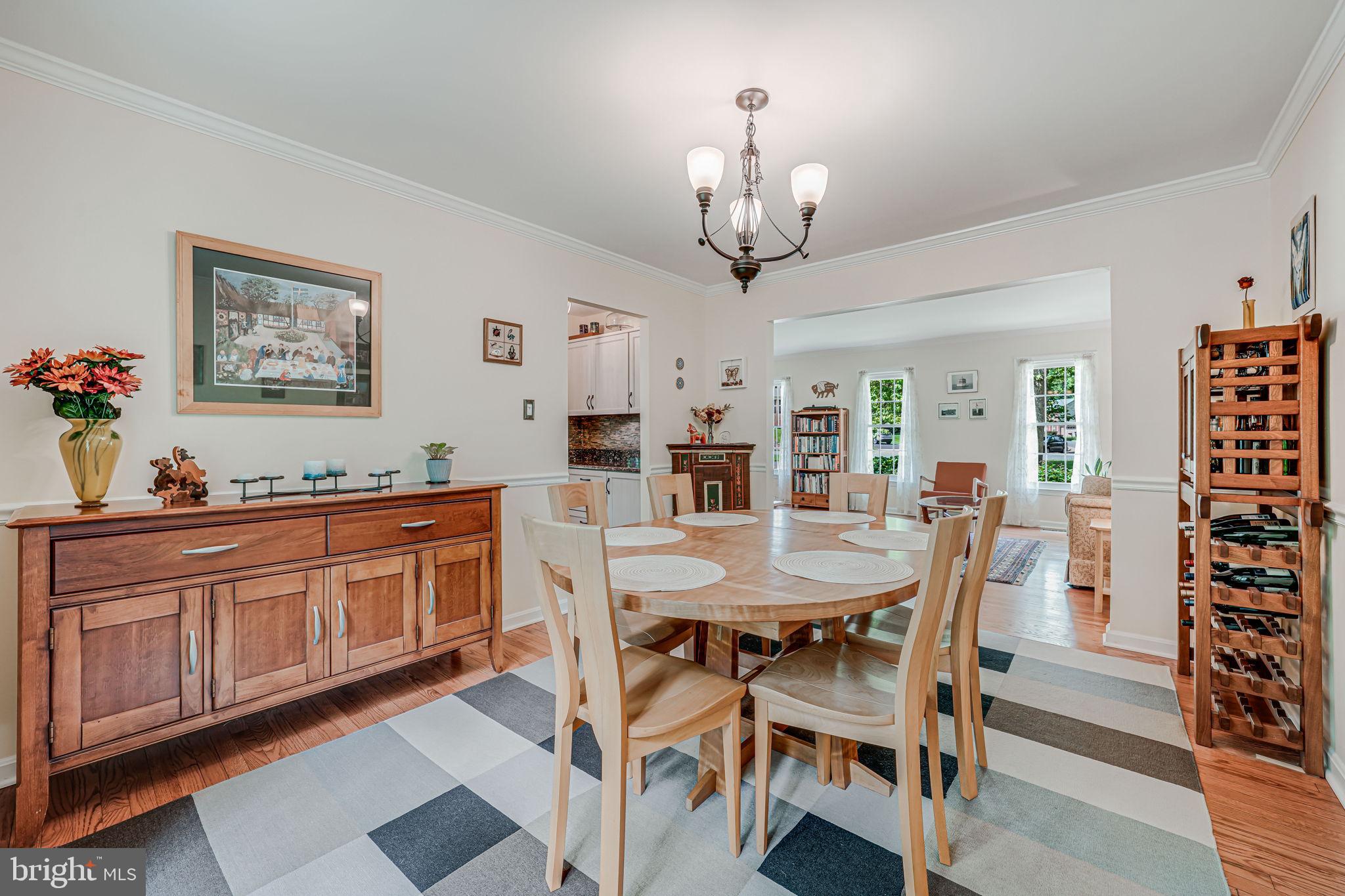 9802 Natick Road Burke, VA 22015 - Photo 9 of 45 a view of a dining room with furniture window and wooden floor