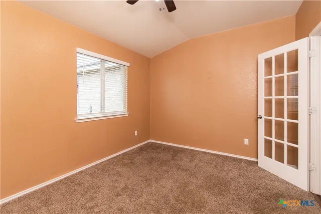 an empty room with windows