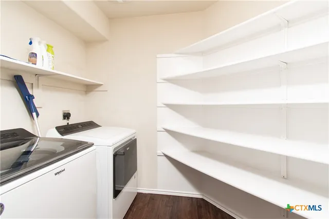a utility room with dryer and washer