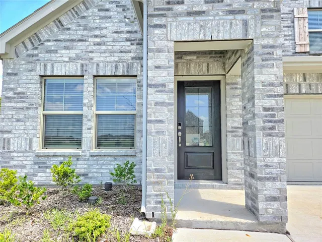 a stone house with a outdoor space
