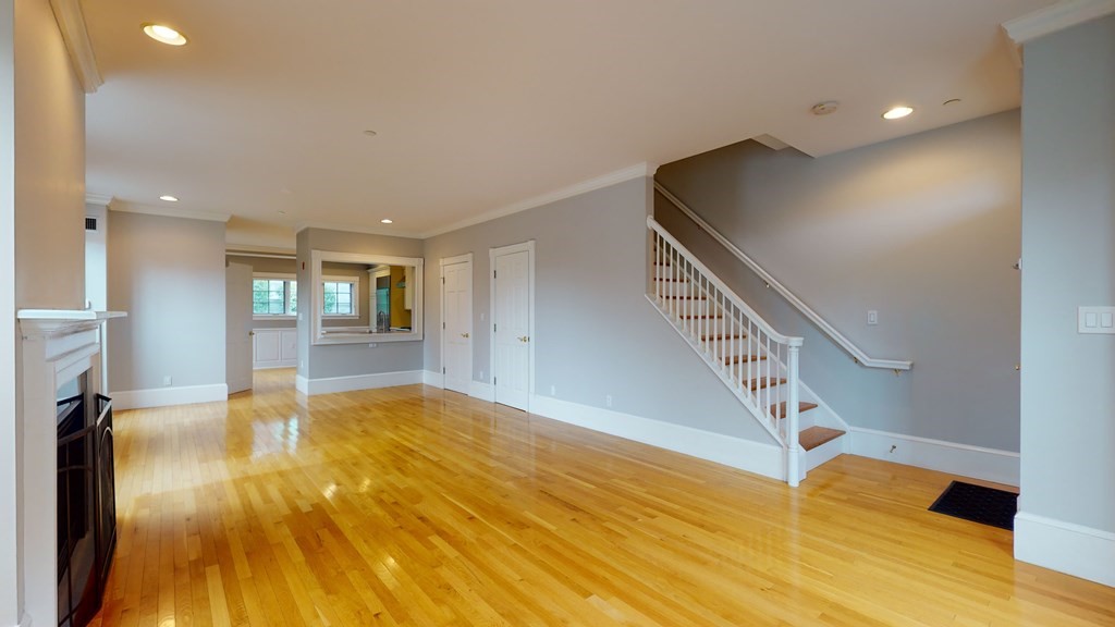 90 Constitution Road, Unit 90 Boston, MA 02129 - Photo 17 of 37 a view of empty room with wooden floor