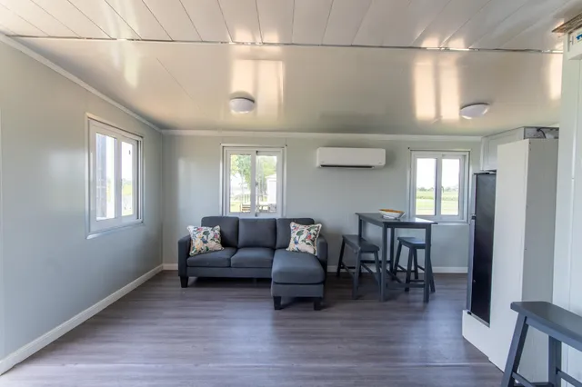 a bathroom with a toilet sink and shower