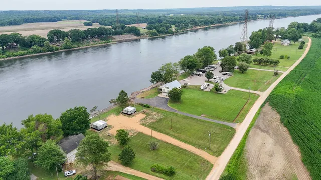 an aerial view of a house having yard