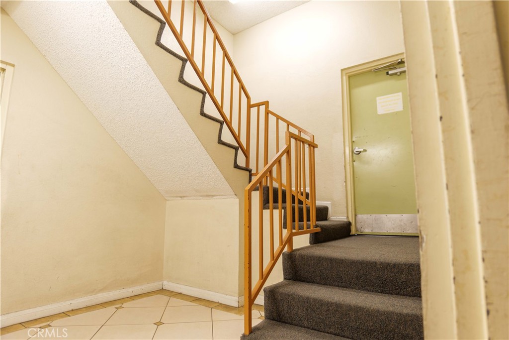3516 East Ransom Street, Unit 204 Long Beach, CA 90804 - Photo 32 of 38 a view of entryway and hall with wooden floor