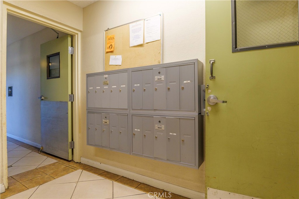 3516 East Ransom Street, Unit 204 Long Beach, CA 90804 - Photo 33 of 38 hallway view with wooden floor