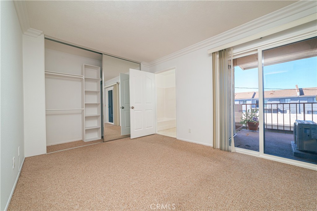 3516 East Ransom Street, Unit 204 Long Beach, CA 90804 - Photo 6 of 38 a view of empty room with a ceiling fan