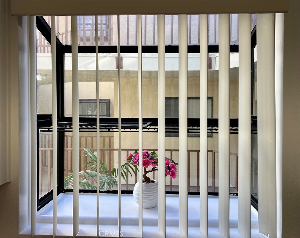 3516 East Ransom Street, Unit 204 Long Beach, CA 90804 - Photo 9 of 38 a view of wooden balcony