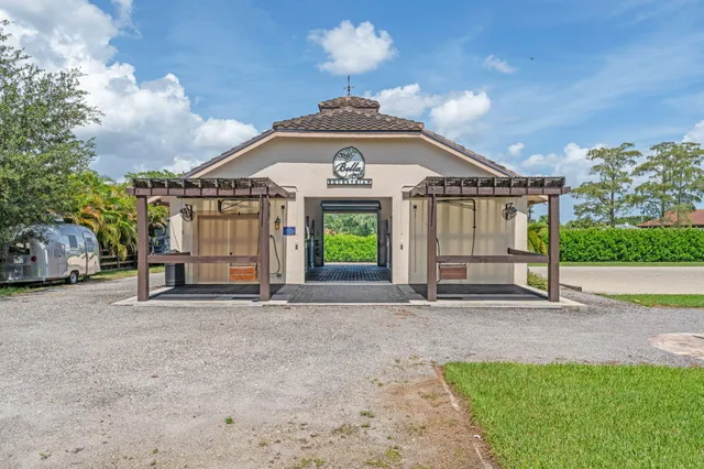 a view of a golf course with a lake