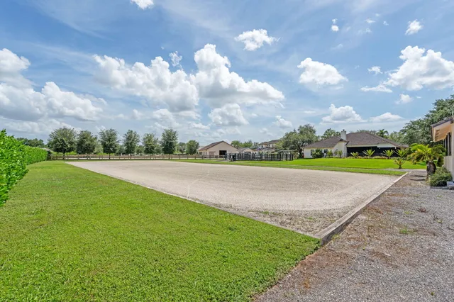 a kitchen with a sink a stove top oven and white kitchen