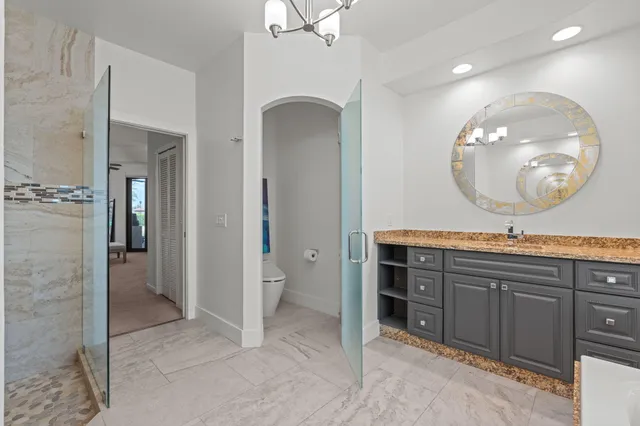 an aerial view of residential house with outdoor space and parking