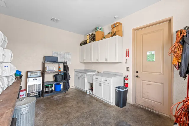 a view of an entryway with wooden floor and windows