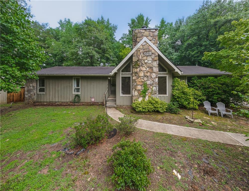 a house view with a garden space