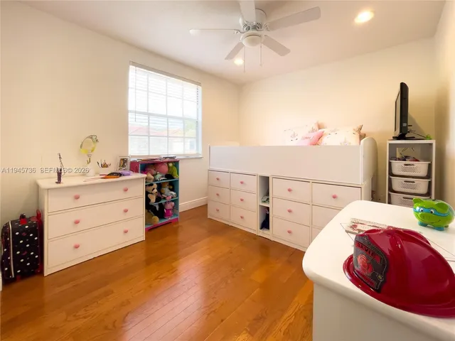 a bed room with a bed and a window