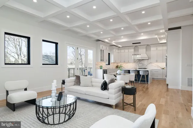 a kitchen with granite countertop a sink appliances cabinets and counter space