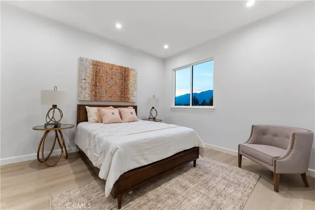 a bedroom with a bed and a couch