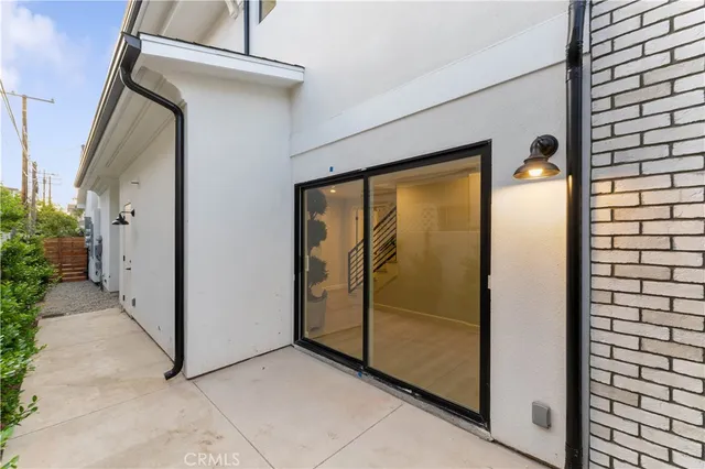 a view of a back yard from a hallway