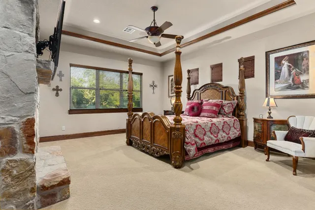 a kitchen with granite countertop stainless steel appliances and wooden floor