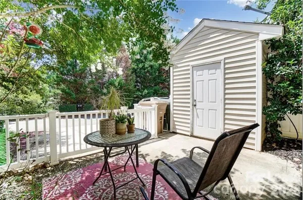 a view of a tables and chairs in the patio