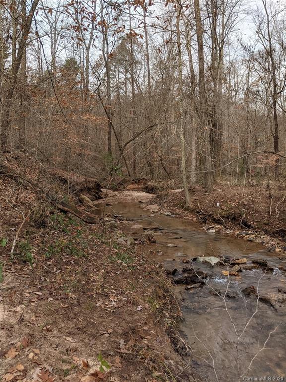 0 Hill Farm Road Hiddenite, NC 28636 - Photo 7 of 19 a view of a yard with a tree