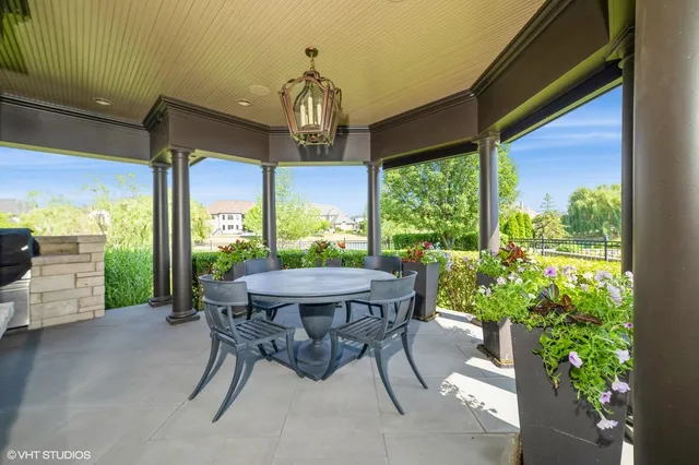 a view of an outdoor dining space with furniture