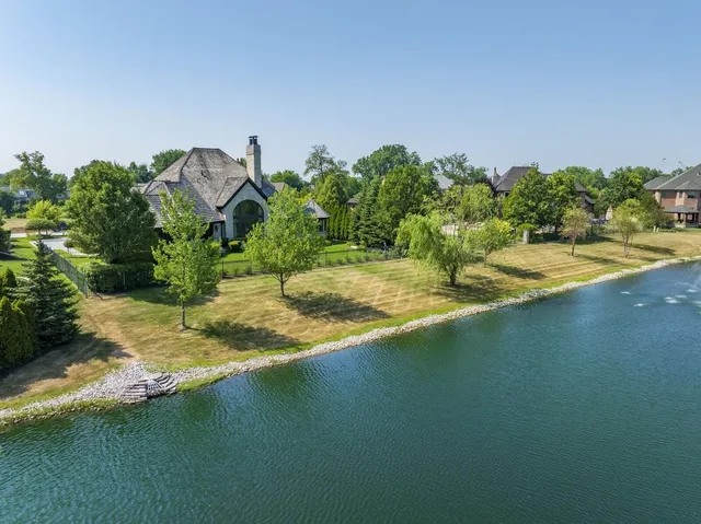a view of a field with sitting area