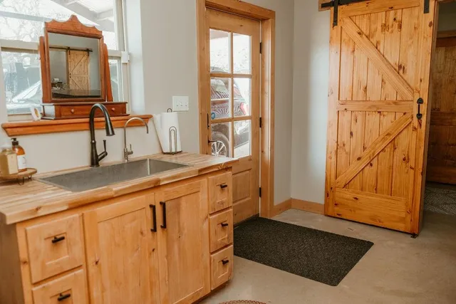 view of room with wooden floor and windows