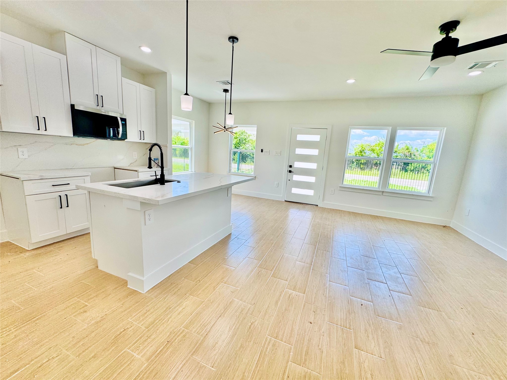 5710 Delmack Street, Unit A Houston, TX 77032 - Photo 1 of 23 Kitchen & Living Room