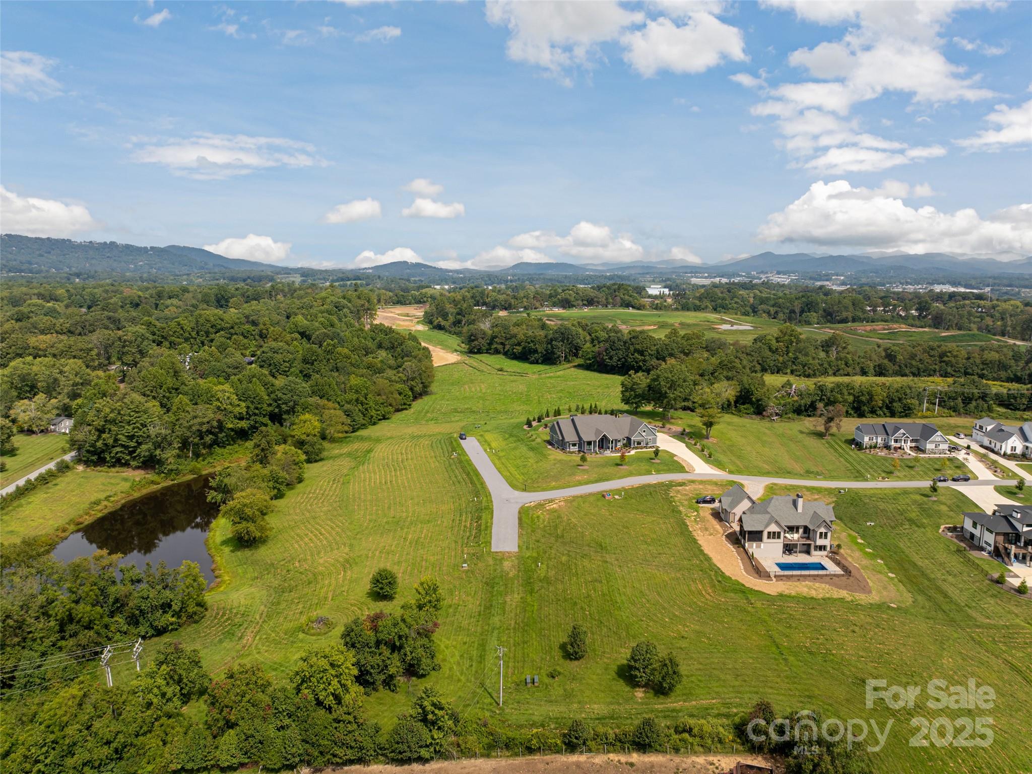 301 Majestic Ridge Road, Unit 57 Mills River, NC 28759 - Photo 11 of 25 a view of a city with an ocean