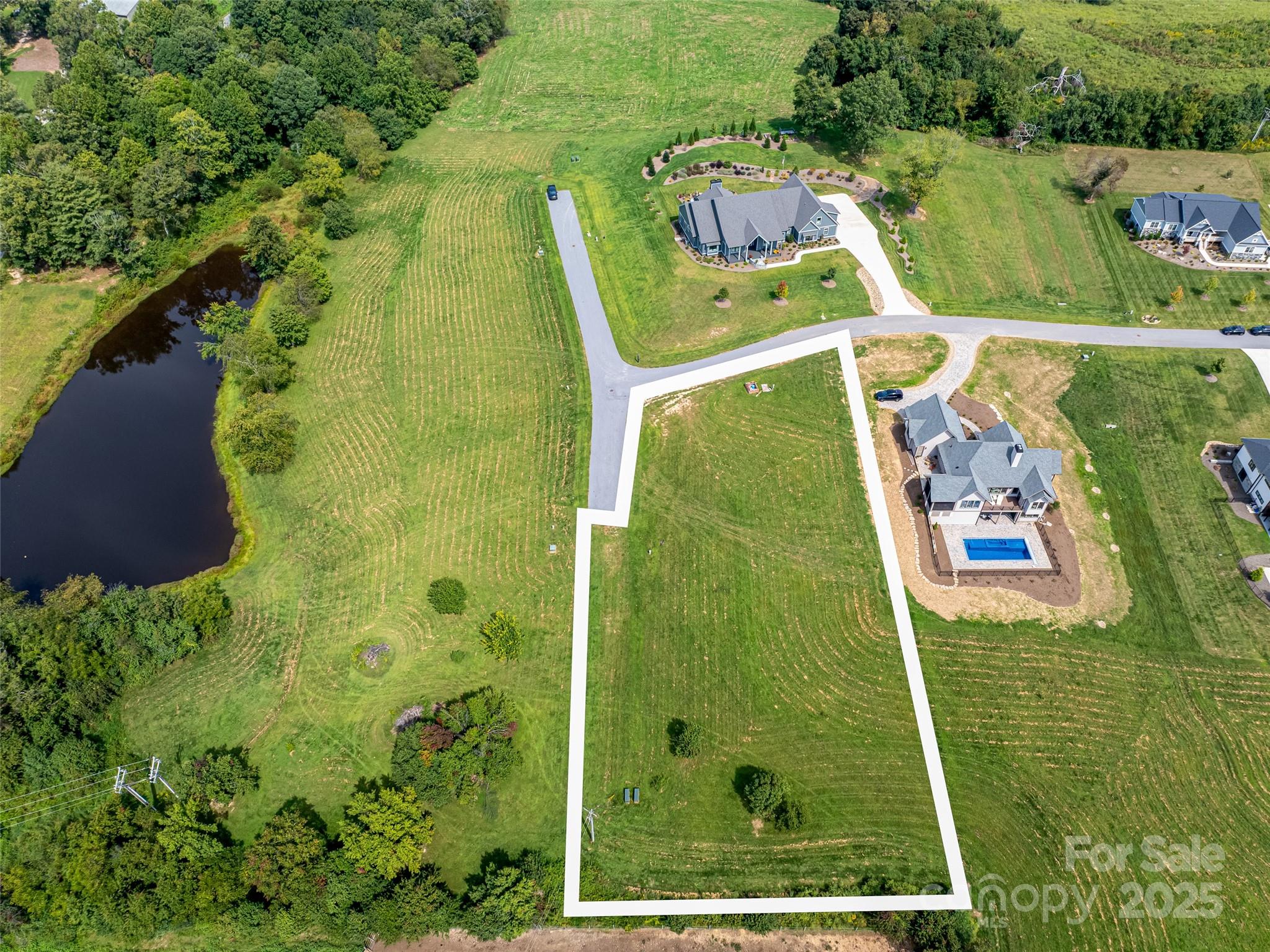 301 Majestic Ridge Road, Unit 57 Mills River, NC 28759 - Photo 2 of 25 an aerial view of a pool