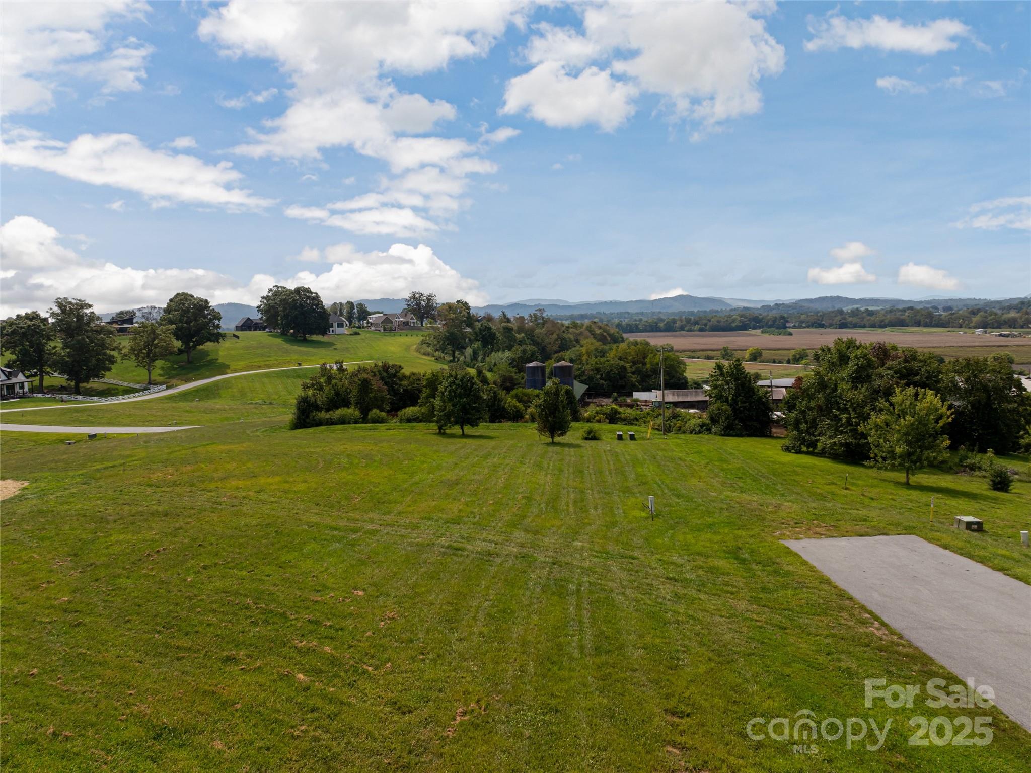 301 Majestic Ridge Road, Unit 57 Mills River, NC 28759 - Photo 6 of 25 a view of an outdoor space and yard