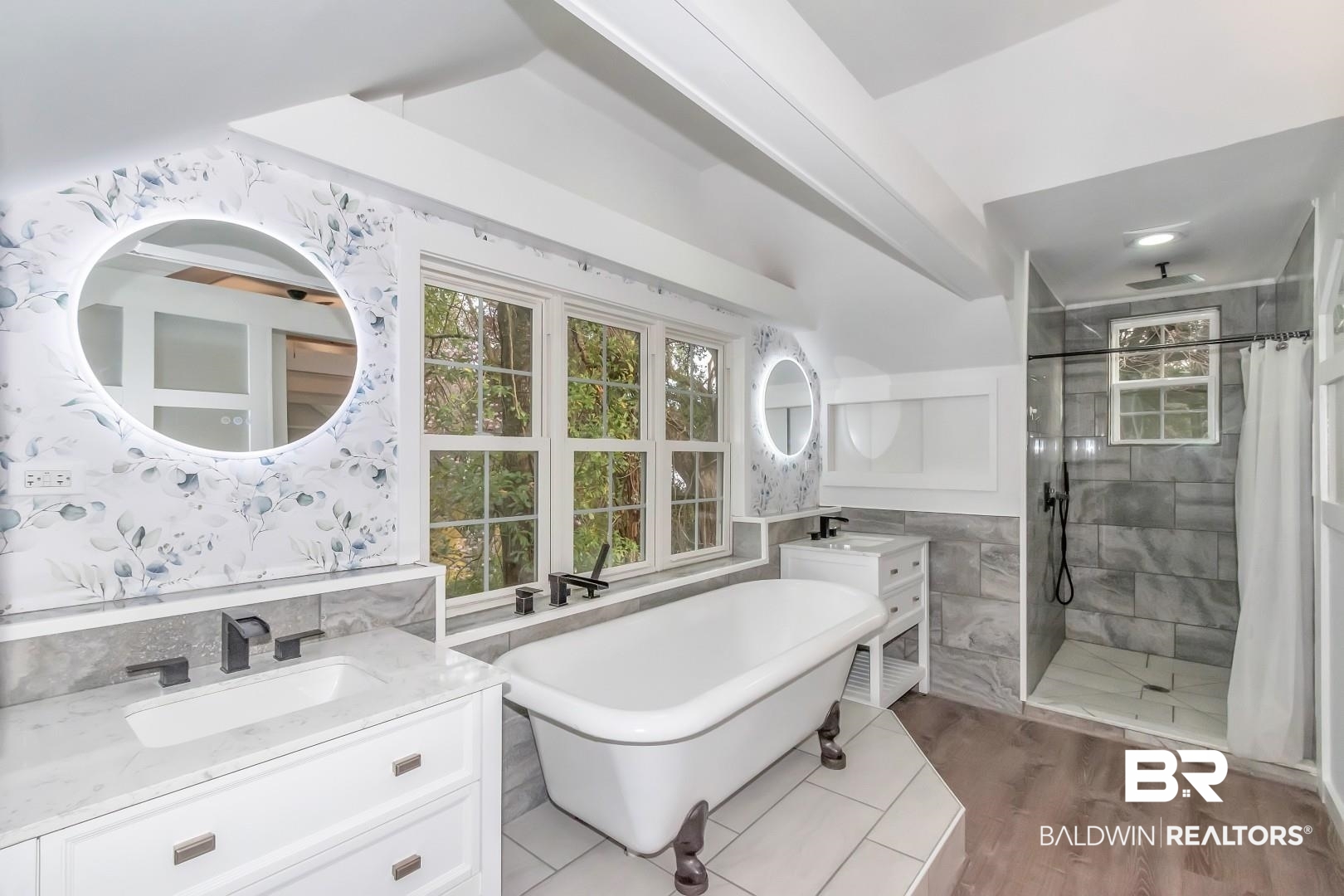 2157 Homewood Street Mobile, AL 36606 - Photo 22 of 36 Bathroom featuring wood finished floors, a sink, tile walls, a soaking tub, and a tile shower