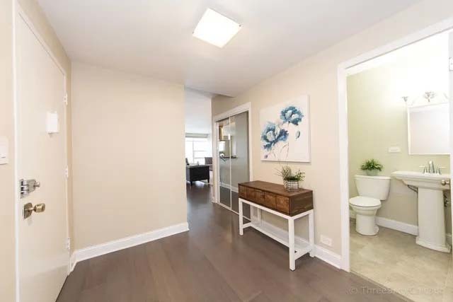 3180 North Lake Shore Drive, Unit 17E Chicago, IL 60657 - Photo 17 of 38 a room with furniture and window