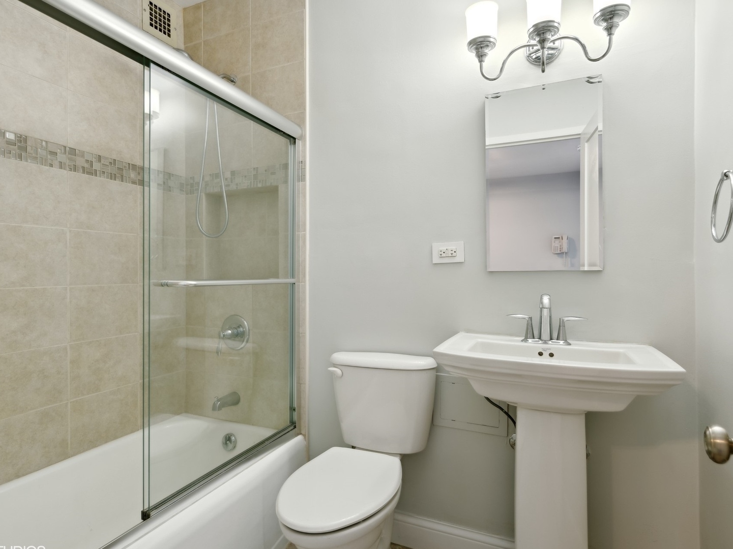 3180 North Lake Shore Drive, Unit 17E Chicago, IL 60657 - Photo 23 of 38 a bathroom with a sink toilet and shower