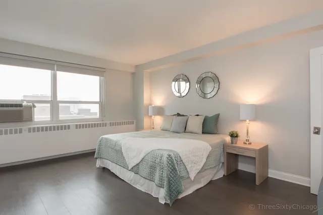 3180 North Lake Shore Drive, Unit 17E Chicago, IL 60657 - Photo 25 of 38 a bedroom with a bed and a window