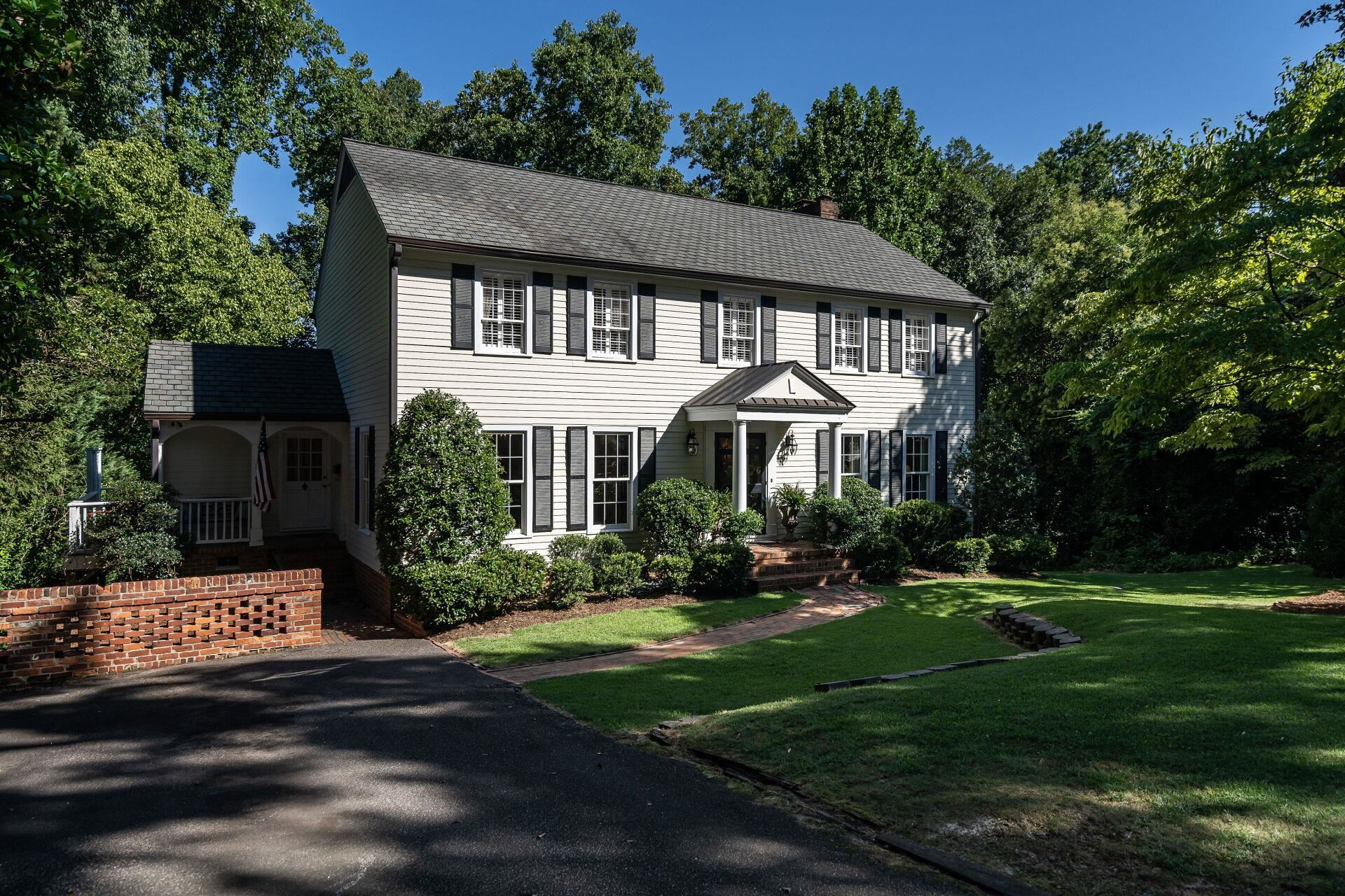 2834 Exeter Circle Raleigh, NC 27608 - Photo 1 of 30 a front view of a house with garden