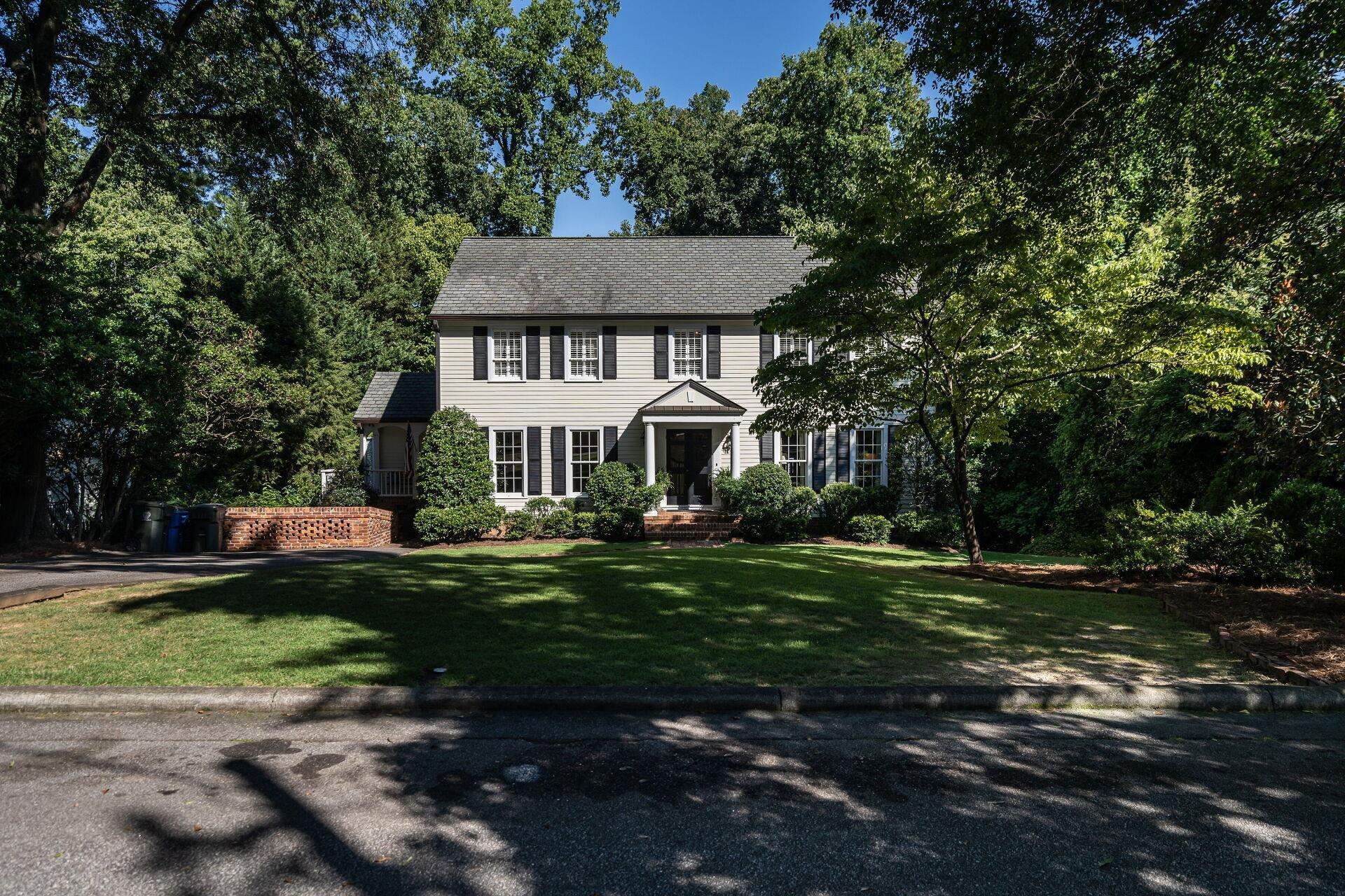 2834 Exeter Circle Raleigh, NC 27608 - Photo 2 of 30 a front view of a house with a yard