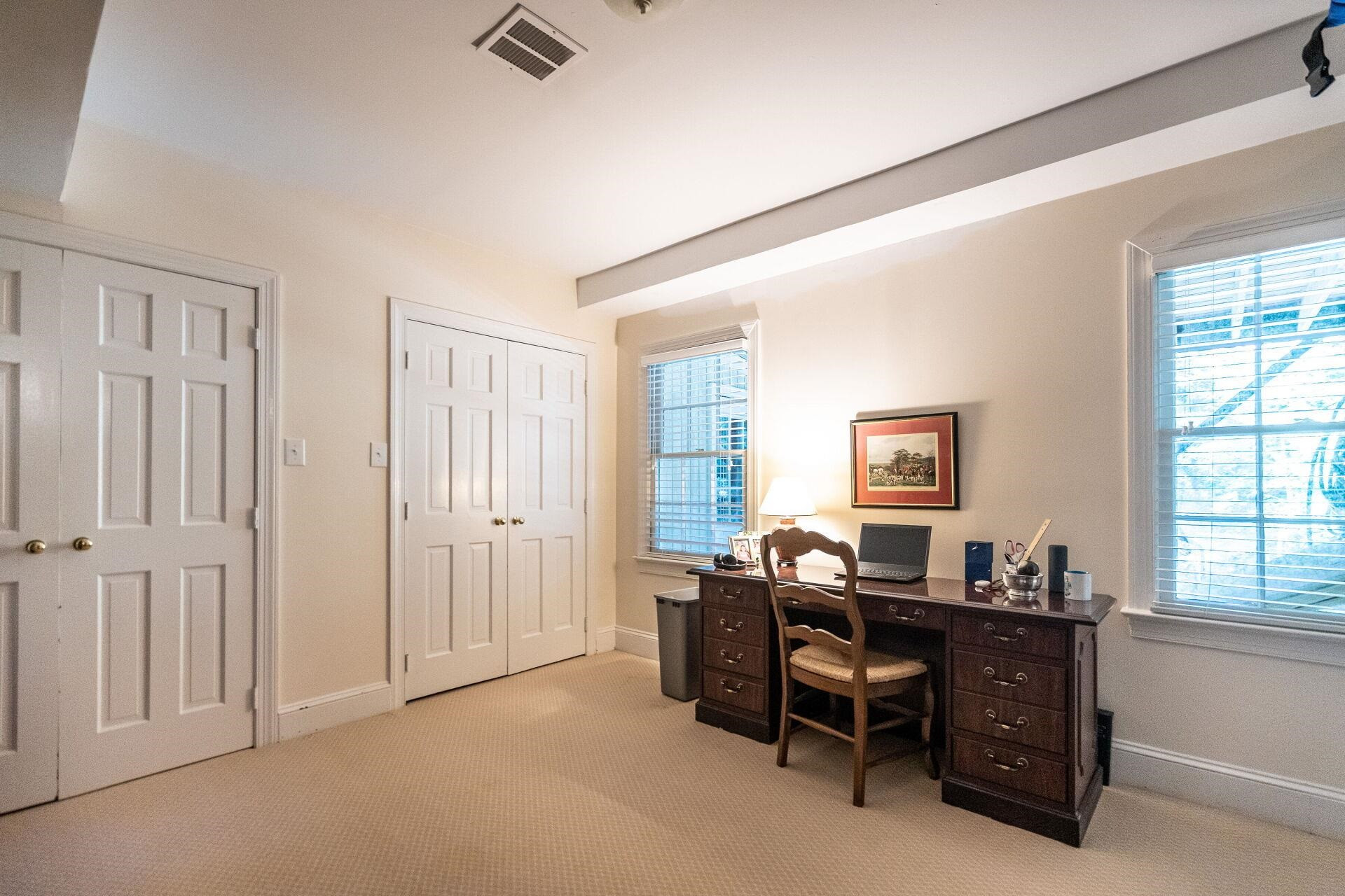 2834 Exeter Circle Raleigh, NC 27608 - Photo 21 of 30 a view of a workspace with furniture and a window