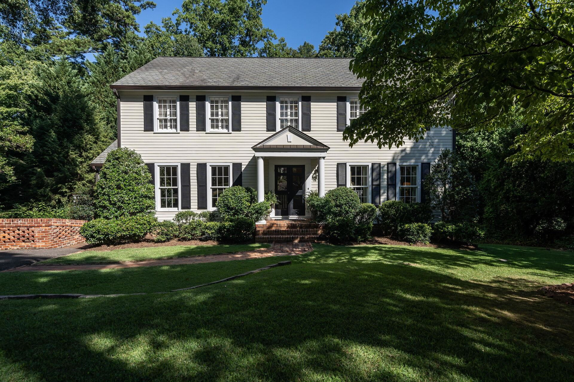 2834 Exeter Circle Raleigh, NC 27608 - Photo 30 of 30 a front view of a house with a yard table and chairs