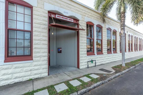 a front view of a house with a garage