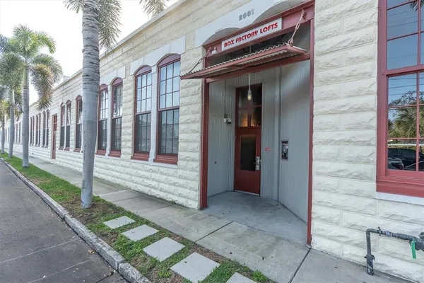 a view of front door of house with a porch