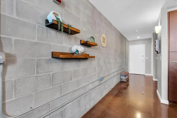 a view of storage and utility room with empty racks