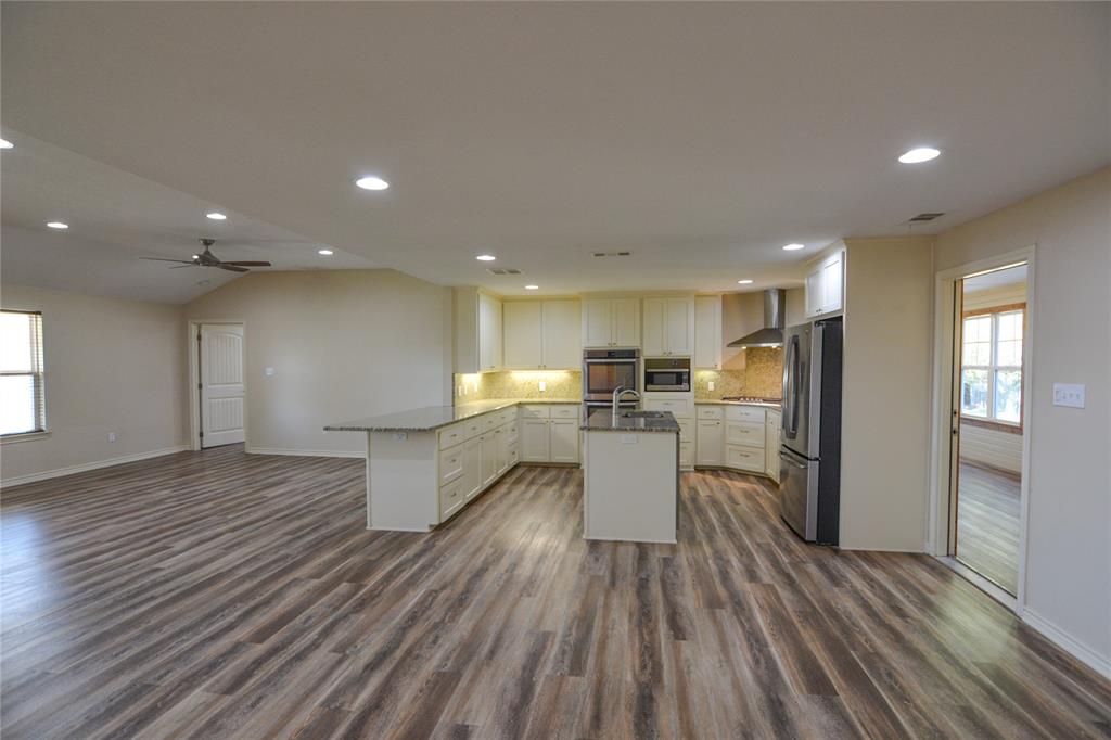 322 Hcr 2320 Abbott, TX 76621 - Photo 11 of 40 a view of a kitchen with a sink and breakfast area