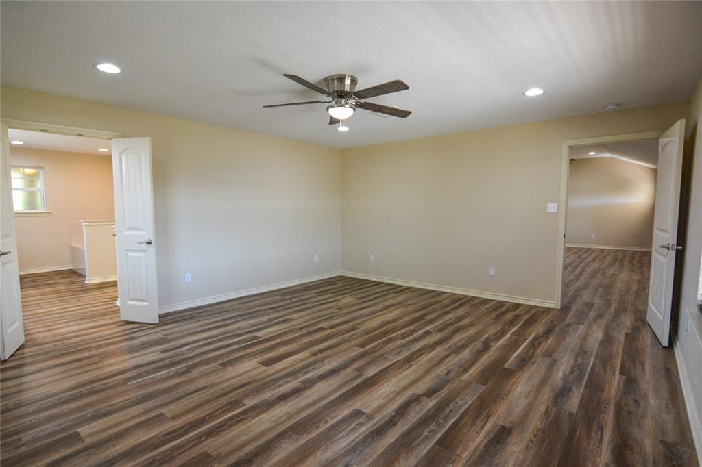 322 Hcr 2320 Abbott, TX 76621 - Photo 21 of 40 wooden floor in an empty room with a window