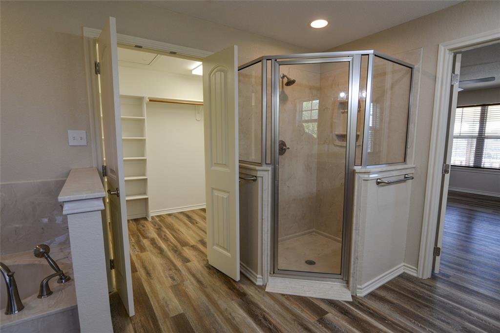 322 Hcr 2320 Abbott, TX 76621 - Photo 24 of 40 a bathroom with a shower and a glass door
